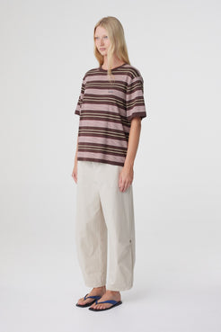 Lena Barrel Pant in Taupe, three quarter view styled with a Red & Brown Retro Stripe tee.