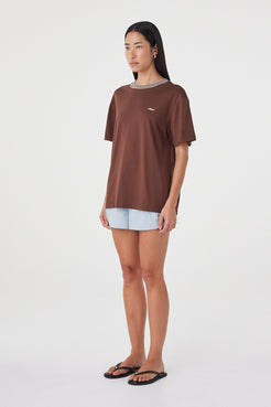 Kylen Tee in Espresso & Cream three-quarter view showing the oversized silhouette, dropped shape through the shoulders and contrast collar.