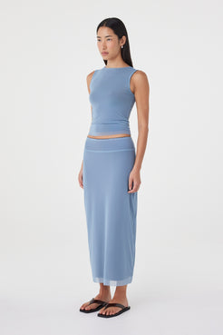 Side view of the Eden Reversible Skirt in Pale Blue & Espresso highlighting the longline fit, smooth drape and reversible construction.