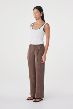 Angled full-length view of the Maisie Tie Pant in Espresso showing the fluid drape and relaxed fit through the hip and leg.