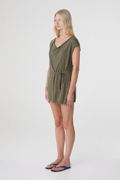 Nora Top in Smokey Olive, three quarter view highlighting the draped neckline, side seam split and longline shape.