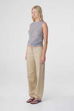 Sabi Pant in Taupe styled with a grey sleeveless top, three quarter view showing the relaxed straight leg shape.