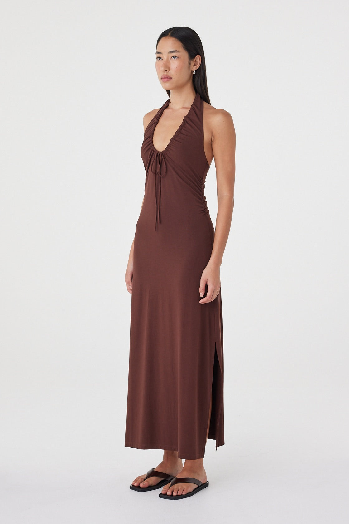 Side view of the Suki Dress in Espresso highlighting the longline shape, soft drape and side split.