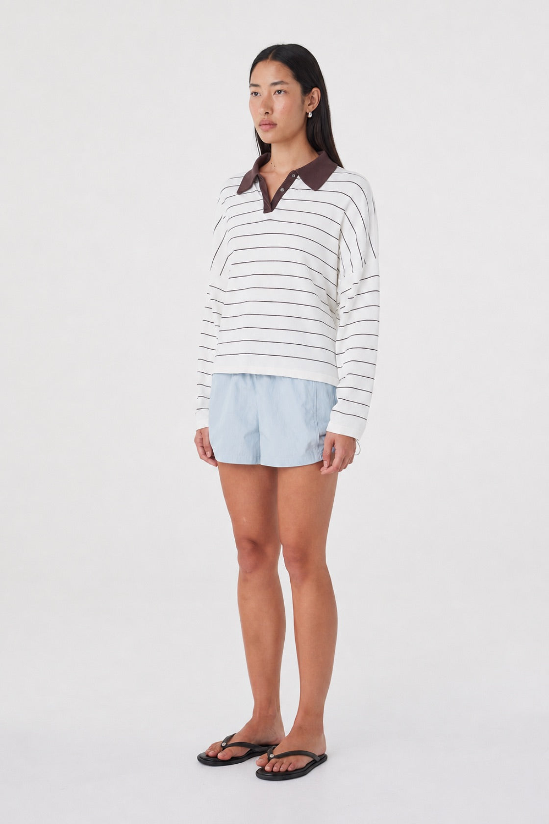 Full-length view of the Addie Short in Pale Blue styled with the Zia Tie Knit Jersey in Cream Stripe for an effortless everyday look.