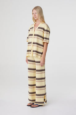 Willa Pant in Butter Espresso Stripe, three quarter view with the matching shirt, showing the full length relaxed silhouette