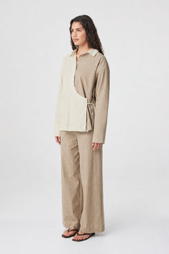 Autumn Wrap Shirt in Two Tone Check styled with coordinating check pants, full-length 3/4 view showing the oversized fit and curved hem.