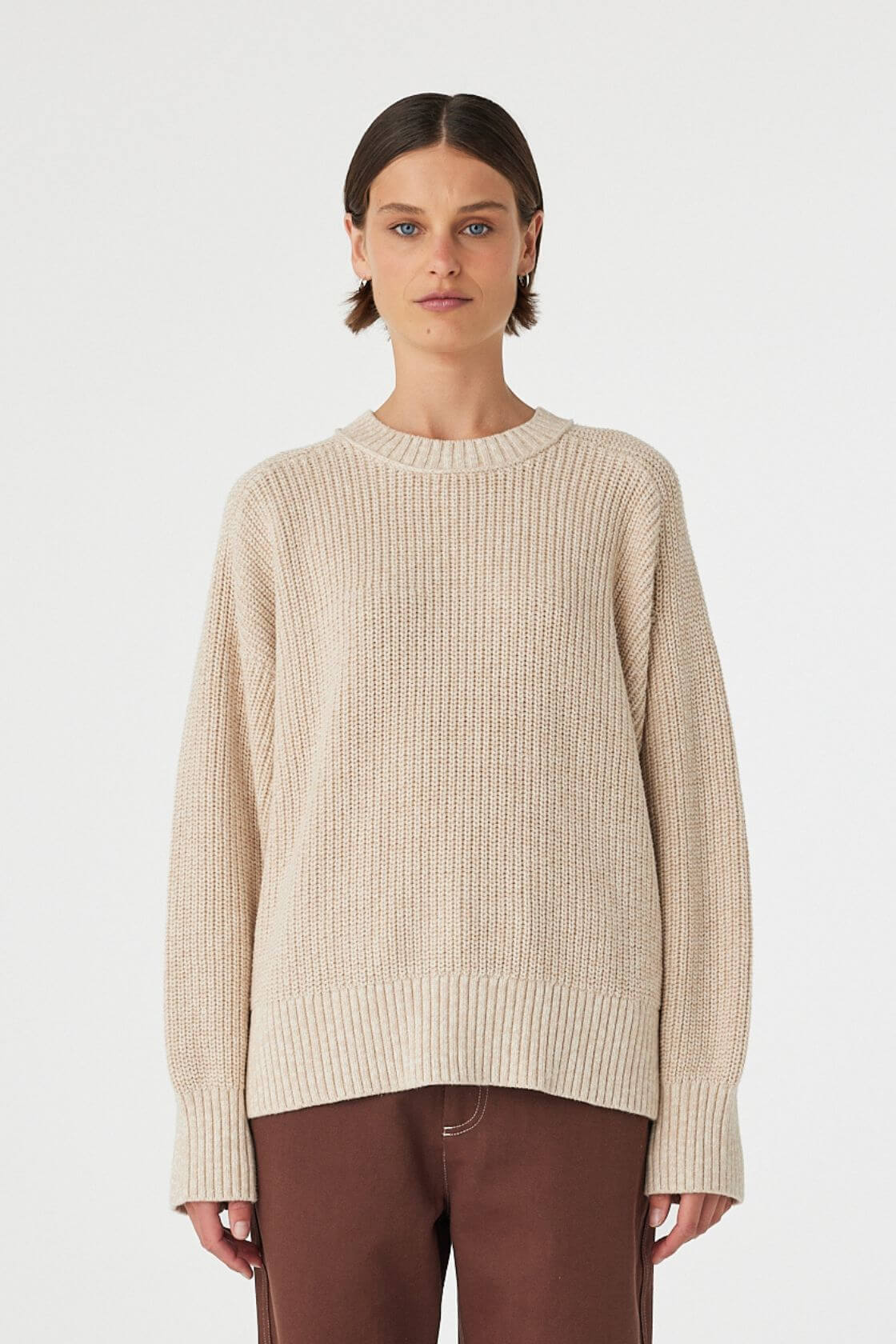 Front view of cream and sand chunky knit sweater with ribbed neckline