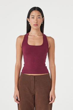 Full-length front view of the Sable Top in merlot styled with espresso straight-leg pants, featuring a clean scoop neckline and minimal slim fit