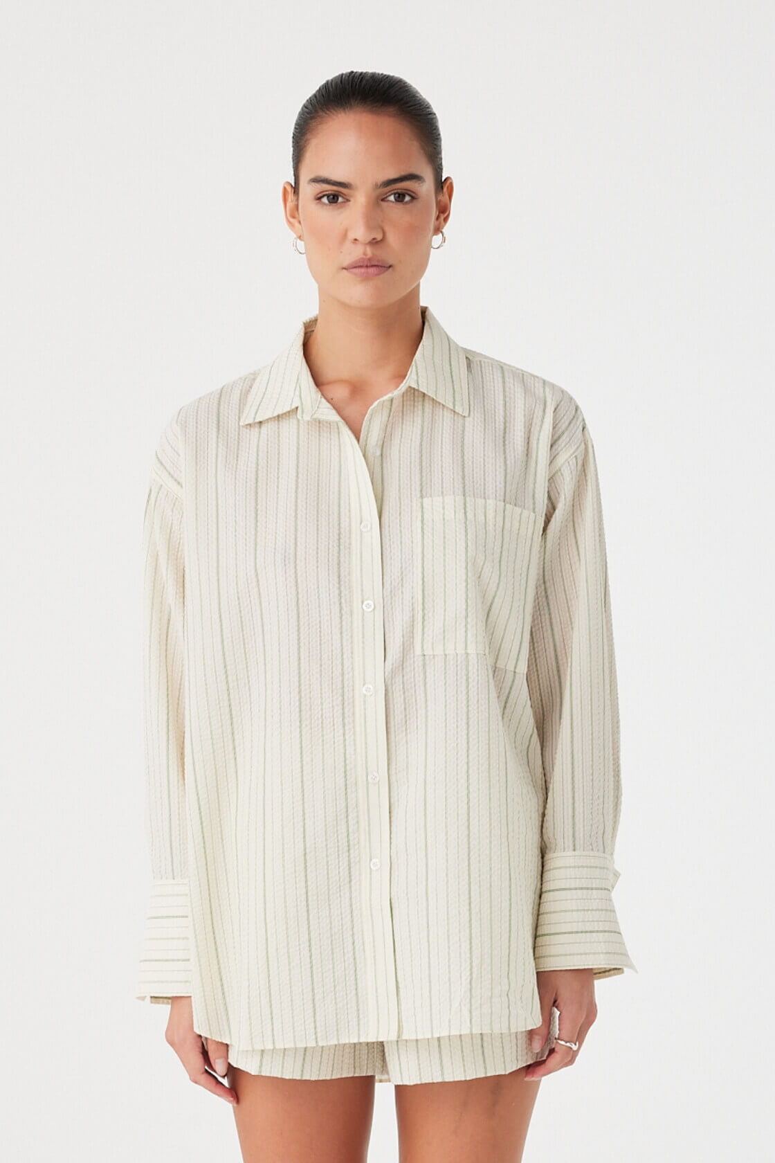 Lightweight textured cotton stripe shirt in olive with pleated back and relaxed silhouette.